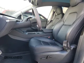 2024 Tesla Model Y Performance with VIN 7SAYGDEF2RF113873, listed as a Copart auction lot 46181915 with 19,625 mi miles and Salvage Title. Bid and sale history available at DreamBid. Image 7.