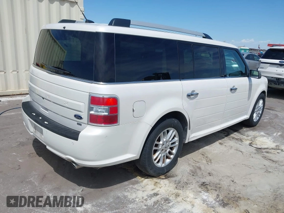 2015 Ford Flex SEL with VIN 2FMHK6C85FBA09233, listed as a IAAI auction lot 42142972 with 221,909 mi miles. Bid and sale history available at carsss.com. Image 4.