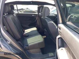 2023 Volkswagen Tiguan SE R-Line Black with VIN 3VVCB7AX8PM036684, listed as a IAAI auction lot 42169004 with 25,024 mi miles and . Bid and sale history available at DreamBid. Image 8.