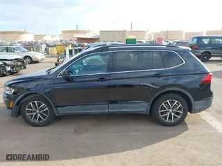 2019 Volkswagen Tiguan SE with VIN 3VV3B7AXXKM012766, listed as a IAAI auction lot 41571347 with 56,594 mi miles. Bid and sale history available at carsss.com. Image 14.