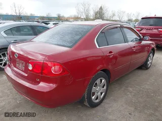 2008 Kia Optima LX with VIN KNAGE123885257626, listed as a IAAI auction lot 42072433 with 106,572 mi miles. Bid and sale history available at carsss.com. Image 4.
