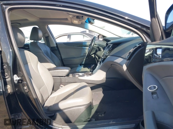 2014 Hyundai Sonata SE with VIN 5NPEC4AC2EH892551, listed as a IAAI auction lot 42016536 with 134,043 mi miles and . Bid and sale history available at DreamBid. Image 5.