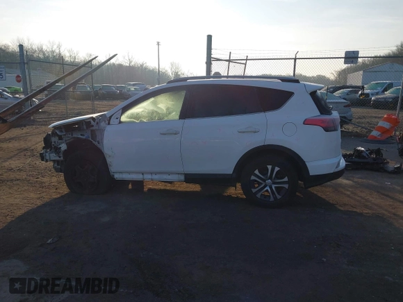 2017 Toyota RAV4 LE with VIN JTMZFREV7HJ120317, listed as a IAAI auction lot 41166489 with 144,799 mi miles and . Bid and sale history available at carsss.com. Image 15.