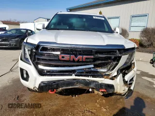 2021 GMC Yukon AT4 with VIN 1GKS2CKD1MR285818, listed as a Copart auction lot 44704525 with 56,635 mi miles and Salvage Title. Bid and sale history available at carsss.com. Image 5.