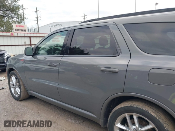 2023 Dodge Durango GT Plus with VIN 1C4RDHDG3PC601932, listed as a IAAI auction lot 41238697 with 56,294 mi miles and . Bid and sale history available at DreamBid. Image 14.