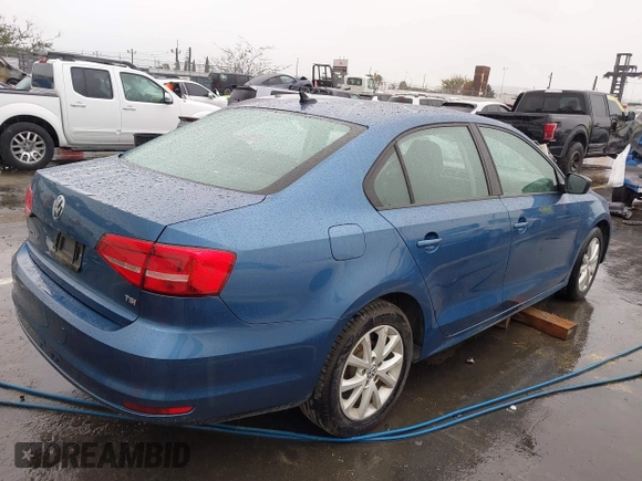 2015 Volkswagen Jetta Sedan 1.8T SE with VIN 3VWD17AJ5FM310694, listed as a IAAI auction lot 41735569 with 147,232 mi miles. Bid and sale history available at carsss.com. Image 4.