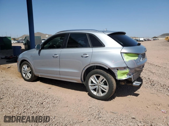 2018 Audi Q3 Premium with VIN WA1ECCFS0JR004256, listed as a Copart auction lot 56906885 with 66,581 mi miles and Salvage title. Bid and sale history available at DreamBid. Image 2.