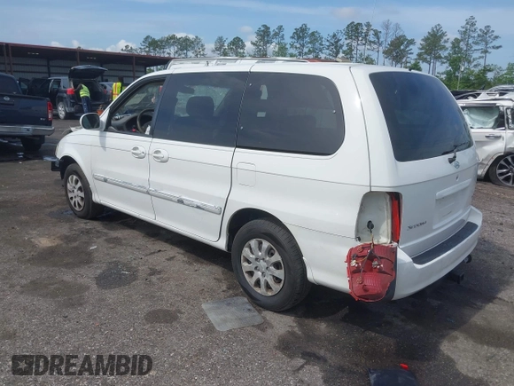2005 Kia Sedona LX with VIN KNDUP132056702484, listed as a IAAI auction lot 42099572 with 195,528 mi miles and . Bid and sale history available at DreamBid. Image 3.