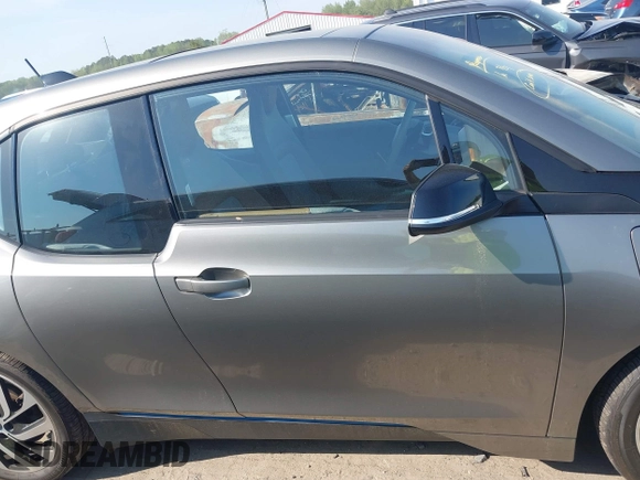 2017 BMW i3 z VIN WBY1Z8C37HV895319, wystawiony jako IAAI lot #42005859 z przebiegiem 84 271 mil mil oraz . Historia ofert i sprzedaży dostępna na DreamBid. Obrazek 14.
