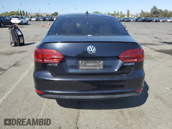 2014 Volkswagen Jetta Hybrid SE z VIN 3VW637AJ7EM296699, wystawiony jako Copart lot #61054715 z przebiegiem 147 308 mil mil oraz Czysty tytuł • Clean title. Historia ofert i sprzedaży dostępna na DreamBid. Obrazek 6.