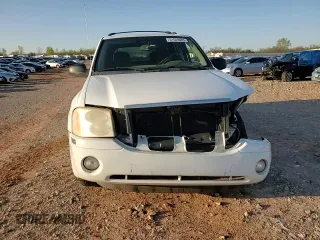 2006 GMC Envoy SLE z VIN 1GKDT13S562124794, wystawiony jako Copart lot #51649085 z przebiegiem 152 844 mil mil oraz Szkoda całkowita • Salvage title. Historia ofert i sprzedaży dostępna na DreamBid. Obrazek 11.