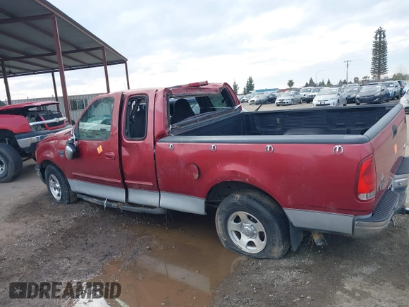 1999 Ford F-150 XL with VIN 1FTRX17L0XKA67494, listed as a IAAI auction lot 41603503 with Not Provided miles. Bid and sale history available at carsss.com. Image 14.