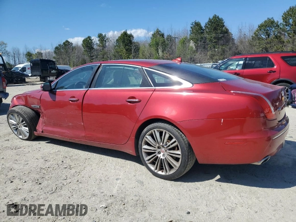 2015 Jaguar XJ Portfolio z VIN SAJWJ2GD9F8V90013, wystawiony jako Copart lot #49766095 z przebiegiem 179 970 mil mil oraz Czysty tytuł • Clean title. Historia ofert i sprzedaży dostępna na DreamBid. Obrazek 2.