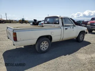 1985 Toyota Pickup z VIN JT4RN50R4F0068265, wystawiony jako Copart lot #51827965 z przebiegiem 348 047 mil mil oraz Szkoda całkowita • Salvage title. Historia ofert i sprzedaży dostępna na DreamBid. Obrazek 3.