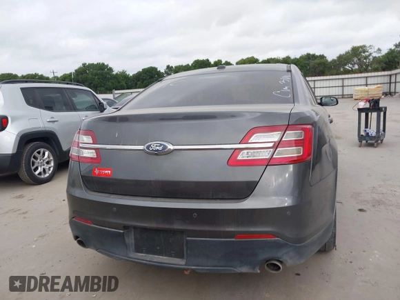 2015 Ford Taurus SEL with VIN 1FAHP2E8XFG161616, listed as a IAAI auction lot 42049199 with 138,565 mi miles and . Bid and sale history available at carsss.com. Image 16.