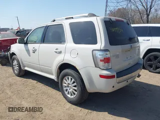 2010 Mercury Mariner Premier with VIN 4M2CN8HG5AKJ07771, listed as a IAAI auction lot 41779514 with 187,786 mi miles and . Bid and sale history available at DreamBid. Image 3.