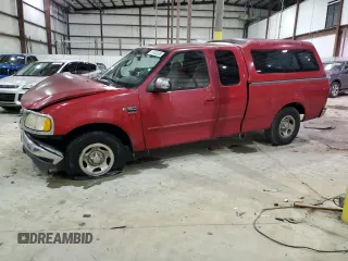 2000 Ford F-150 XL with VIN 1FTRX17W3YNC12019, listed as a Copart auction lot 41402325 with 182,123 mi miles and Salvage Title. Bid and sale history available at carsss.com. Image 1.