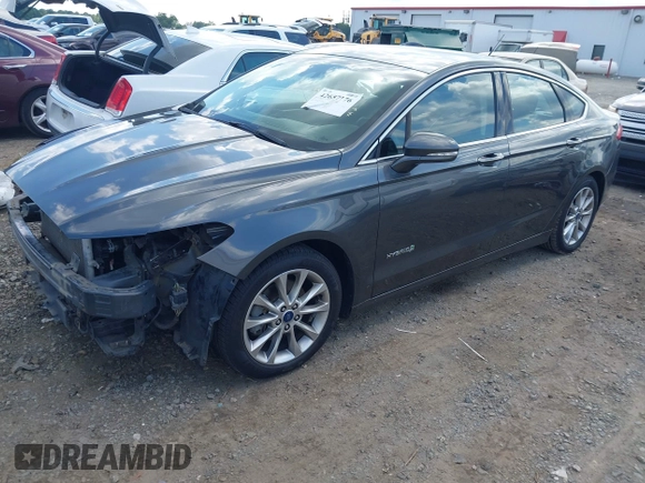 2017 Ford Fusion Hybrid SE z VIN 3FA6P0LU3HR260558, wystawiony jako IAAI lot #42657176 z przebiegiem 161 183 mil mil oraz . Historia ofert i sprzedaży dostępna na DreamBid. Obrazek 20.