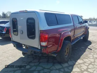 2017 Toyota Tacoma SR5 with VIN 3TMDZ5BN7HM017500, listed as a IAAI auction lot 41819027 with 112,406 mi miles. Bid and sale history available at carsss.com. Image 4.