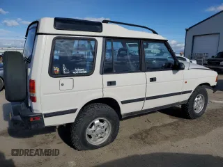 1996 Land Rover Discovery with VIN SALJN1287TA195018, listed as a Copart auction lot 46451505 with 126,913 mi miles and Salvage Title. Bid and sale history available at DreamBid. Image 3.