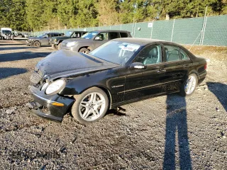2005 Mercedes-Benz E-Class 5.5L AMG with VIN WDBUF76J25A746426, listed as a Copart auction lot 85879584 with 134,055 mi miles and Salvage Title. Bid and sale history available at carsss.com. Image 1.
