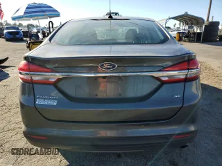 2017 Ford Fusion SE с VIN 3FA6P0H70HR268927, выставлен на аукционе Copart как лот 82872364 с пробегом 60 286 миль миль и Списание • Salvage title. История ставок и продаж доступна на DreamBid. Изображение 6.