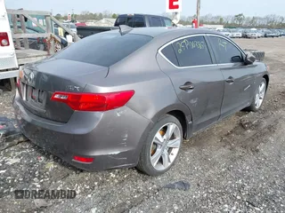 2013 Acura ILX Premium z VIN 19VDE1F54DE001539, wystawiony jako IAAI lot #42015973 z przebiegiem Nie podano mil oraz . Historia ofert i sprzedaży dostępna na DreamBid. Obrazek 4.