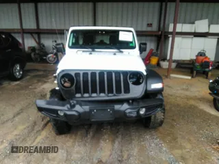 2021 Jeep Wrangler Unlimited Willys with VIN 1C4HJXDN6MW616741, listed as a IAAI auction lot 42009965 with 38,451 mi miles and . Bid and sale history available at DreamBid. Image 12.