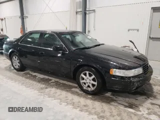 2002 Cadillac Seville Touring STS z VIN 1G6KY54962U158476, wystawiony jako Copart lot #86624774 z przebiegiem 77 818 mil mil oraz Szkoda całkowita • Salvage title. Historia ofert i sprzedaży dostępna na DreamBid. Obrazek 4.
