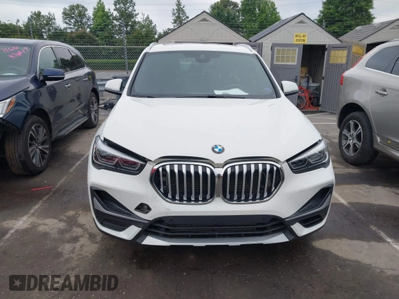 2021 BMW X1 xDrive28i with VIN WBXJG9C01M5S06181, listed as a IAAI auction lot 42292167 with 55,966 mi miles and . Bid and sale history available at DreamBid. Image 12.