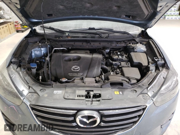 2016 Mazda CX-5 Grand Touring with VIN JM3KE4DY1G0714674, listed as a Copart auction lot 75516524 with 115,766 mi miles and Salvage Title. Bid and sale history available at carsss.com. Image 12.