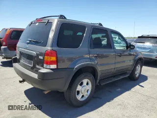 2002 Ford Escape XLT Choice with VIN 1FMYU04182KB99540, listed as a Copart auction lot 61493365 with 156,207 mi miles and Salvage title. Bid and sale history available at DreamBid. Image 3.