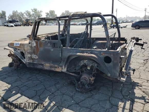 1999 Jeep Wrangler Sahara with VIN 1J4FY49SXXP473446, listed as a Copart auction lot 71836154 with 0 mi miles and Non Repairable. Bid and sale history available at carsss.com. Image 2.