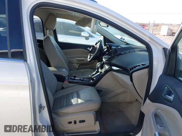 2016 Ford Escape Titanium with VIN 1FMCU0J96GUB36680, listed as a IAAI auction lot 41446705 with 137,926 mi miles. Bid and sale history available at carsss.com. Image 5.