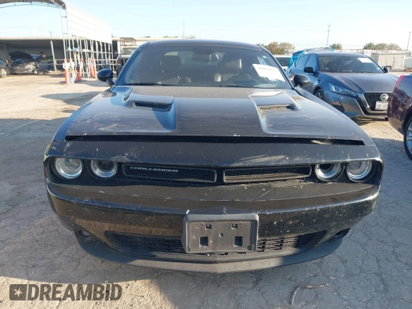 2016 Dodge Challenger SXT Plus z VIN 2C3CDZAG5GH345617, wystawiony jako IAAI lot #40801879 z przebiegiem 94 610 mil mil oraz . Historia ofert i sprzedaży dostępna na DreamBid. Obrazek 12.