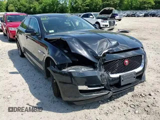 2016 Jaguar XJ R-Sport z VIN SAJWJ1CD8G8V95608, wystawiony jako Copart lot #59103615 z przebiegiem 119 066 mil mil oraz Szkoda całkowita • Salvage title. Historia ofert i sprzedaży dostępna na DreamBid. Obrazek 13.
