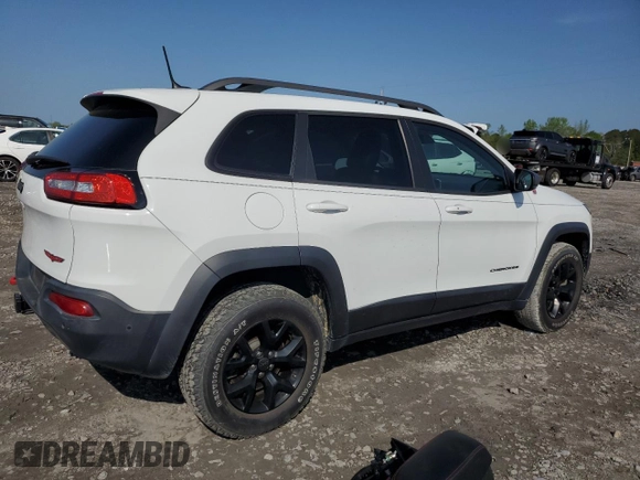2015 Jeep Cherokee Trailhawk z VIN 1C4PJMBS6FW558653, wystawiony jako Copart lot #51066195 z przebiegiem 32 905 mil mil oraz Szkoda całkowita • Salvage title. Historia ofert i sprzedaży dostępna na DreamBid. Obrazek 3.