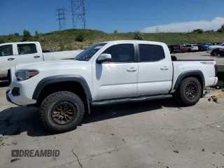 2017 Toyota Tacoma SR5 z VIN 3TMCZ5AN8HM108787, wystawiony jako Copart lot #60438675 z przebiegiem 88 790 mil mil oraz Szkoda całkowita • Salvage title. Historia ofert i sprzedaży dostępna na DreamBid. Obrazek 1.