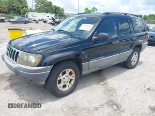 2002 Jeep Grand Cherokee Laredo with VIN 1J4GX48S22C226527, listed as a IAAI auction lot 42630457 with 197,333 mi miles and . Bid and sale history available at DreamBid. Image 2.