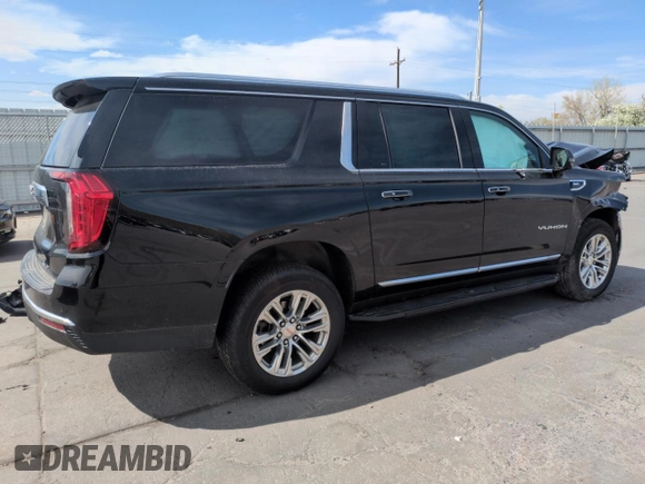 2023 GMC Yukon XL SLT z VIN 1GKS2GKD3PR282110, wystawiony jako Copart lot #52950425 z przebiegiem 99 147 mil mil oraz Szkoda całkowita • Salvage title. Historia ofert i sprzedaży dostępna na DreamBid. Obrazek 3.