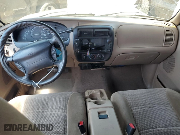 1998 Ford Ranger XL with VIN 1FTZR15X2WPB03820, listed as a Copart auction lot 60717595 with 202,801 mi miles and Salvage title. Bid and sale history available at DreamBid. Image 8.