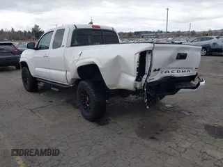 2022 Toyota Tacoma SR with VIN 3TYSX5EN1NT010664, listed as a IAAI auction lot 41642295 with 29,848 mi miles and . Bid and sale history available at DreamBid. Image 3.