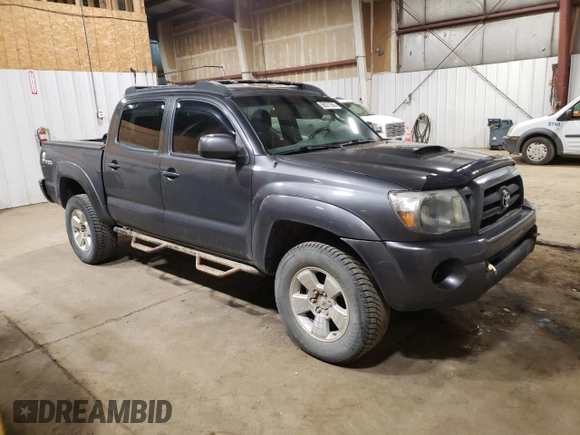 2009 Toyota Tacoma z VIN 3TMLU42N79M027000, wystawiony jako Copart lot #58371365 z przebiegiem 168 989 mil mil oraz Szkoda całkowita • Salvage title. Historia ofert i sprzedaży dostępna na DreamBid. Obrazek 4.