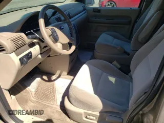 2004 Ford Freestar с VIN 2FMDA57614BA09411, выставлен на аукционе Copart как лот 71191444 с пробегом 115 684 миль миль и Чистый • Clean title. История ставок и продаж доступна на DreamBid. Изображение 7.