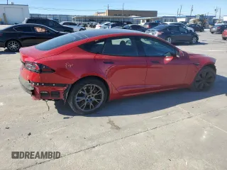 2022 Tesla Model S with VIN 5YJSA1E57NF478036, listed as a Copart auction lot 42147205 with 44,576 mi miles and Salvage title. Bid and sale history available at DreamBid. Image 3.