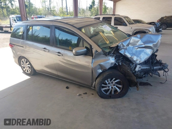 2012 Mazda 5 Sport with VIN JM1CW2BL3C0142202, listed as a IAAI auction lot 42397815 with Not provided miles and . Bid and sale history available at DreamBid. Image 1.