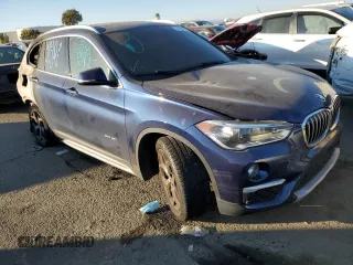2017 BMW X1 sDrive28i with VIN WBXHU7C3XH5H37412, listed as a Copart auction lot 71733512 with 0 mi miles. Bid and sale history available at carsss.com. Image 4.