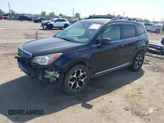 2015 Subaru Forester XT Touring with VIN JF2SJGUC5FH822632, listed as a IAAI auction lot 42032965 with 118,111 mi miles and . Bid and sale history available at DreamBid. Image 2.