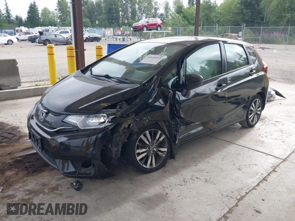 2015 Honda Fit EX-L z VIN 3HGGK5H81FM701122, wystawiony jako IAAI lot #42610165 z przebiegiem 74 969 mil mil oraz . Historia ofert i sprzedaży dostępna na DreamBid. Obrazek 18.