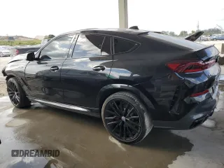 2023 BMW X6 M50i with VIN 5UXCY8C01P9S00552, listed as a Copart auction lot 84193154 with 16,590 mi miles and Salvage Title. Bid and sale history available at carsss.com. Image 2.
